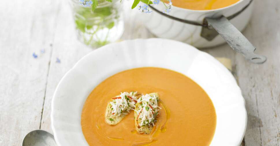 Creamed tomato and orange soup with fresh crab croutes